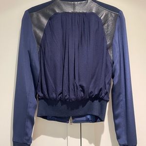 Stunning, cool, blue leather crop jacket. Bought in Aspen boutique.